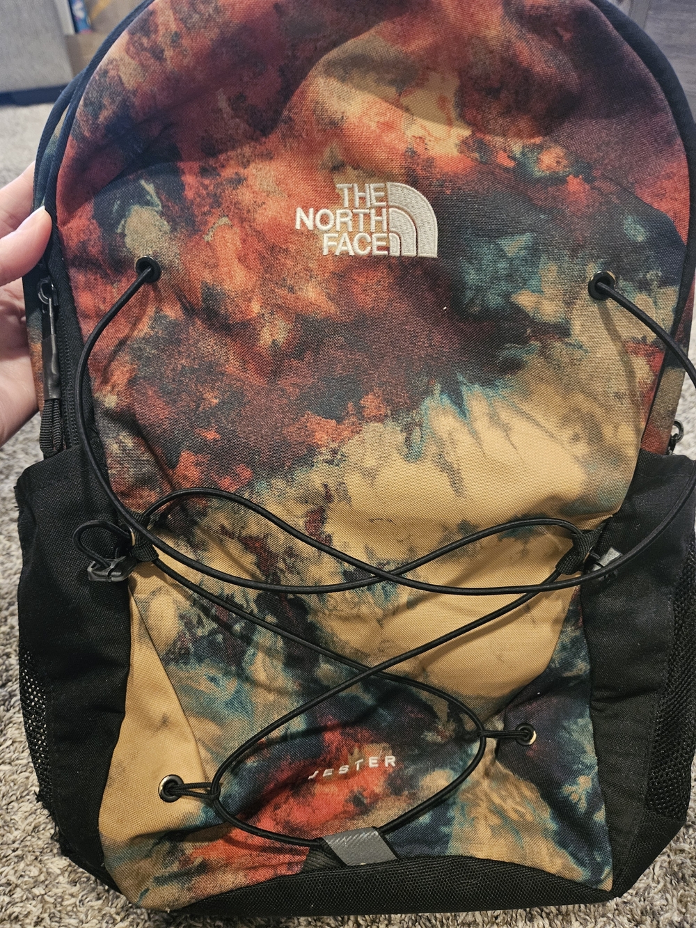 The North Face Multicolor Tie-Dye Backpack with Black Accents and Mustard Panel